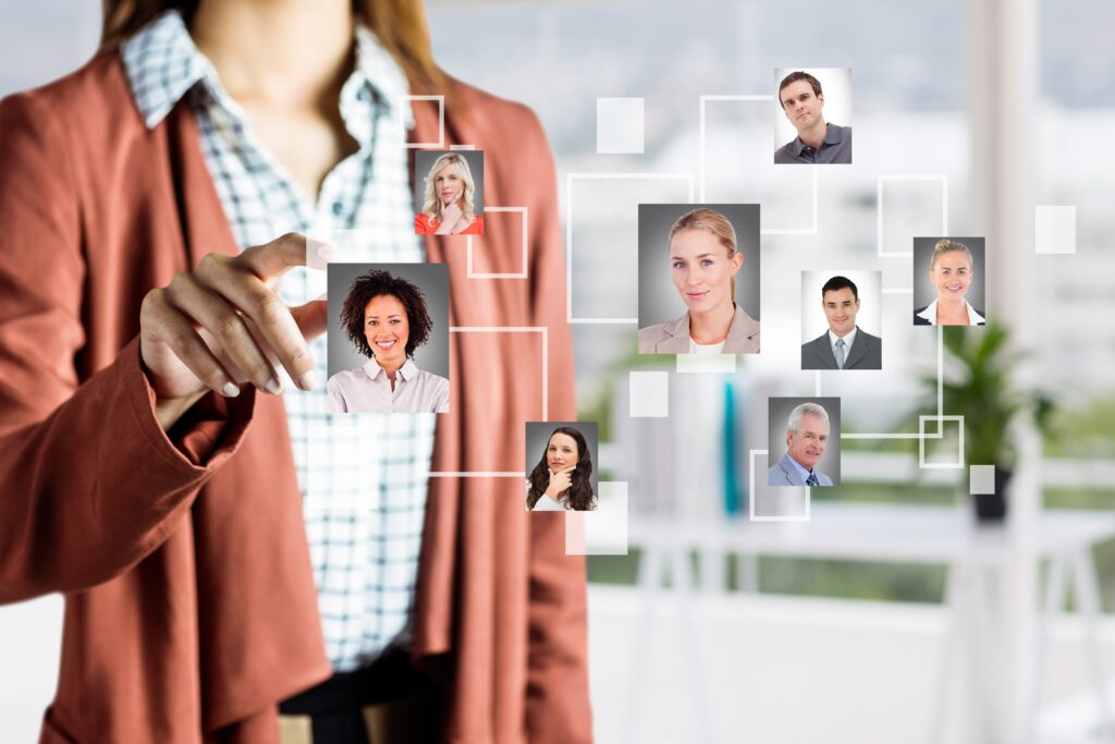 Ilustração de inteligência artificial no RH com pessoas interagindo com gráficos, dados e processos automatizados, representando recrutamento, engajamento e tecnologia aplicada à gestão de pessoas.